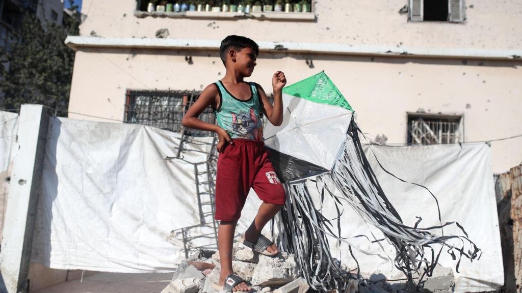 Israel warns of 'forceful' response to kites flown from Gaza