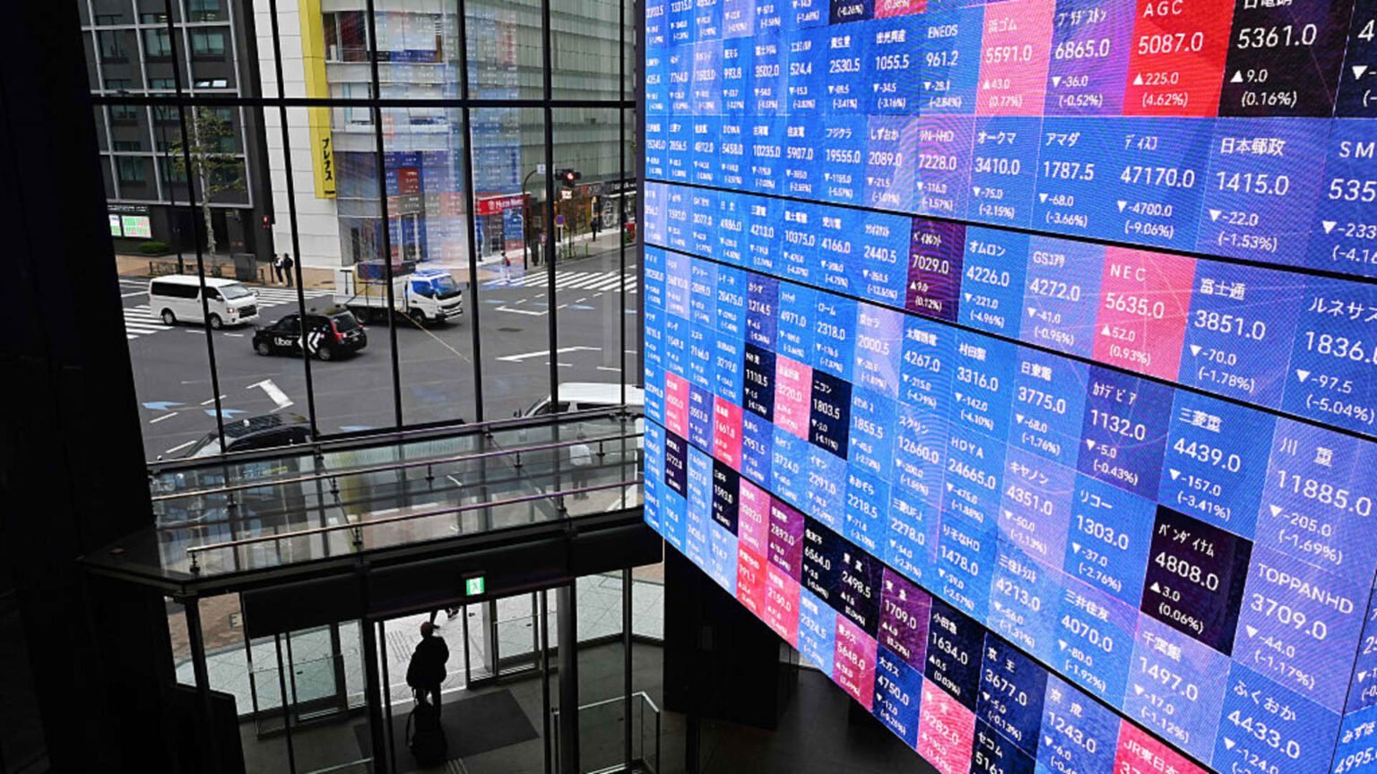 Why Japanese stocks rose as government bond yields and the yen fell after rate hike