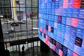 Why Japanese stocks rose as government bond yields and the yen fell after rate hike