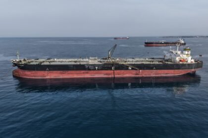 Oil falls as crude flows remain 'surprisingly strong'