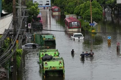 Bangkok streets turn to canals as days of heavy rain bring citywide flooding