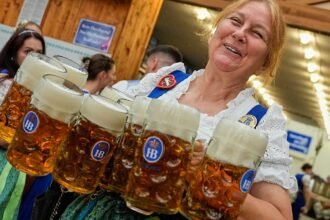 Oktoberfest kicks off with beer, cheers and a traditional first tap