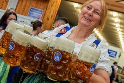 Oktoberfest kicks off with beer, cheers and a traditional first tap