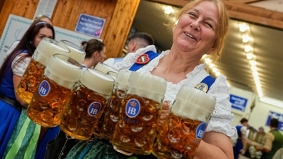 Oktoberfest kicks off with beer, cheers and a traditional first tap