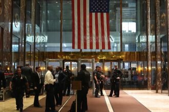 Macron walks through busy New York streets to Trump Tower