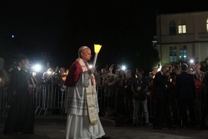 Pope joins pilgrims in Lourdes candlelit rosary as 150,000 attend mass