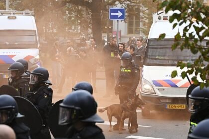 Police clash with far-right protesters at anti-immigration rally in The Hague