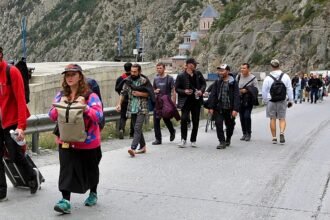 Russians leave before election ends, fearing mobilisation to follow
