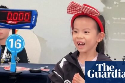 Six-year-old breaks women's world Rubik's Cube record – video