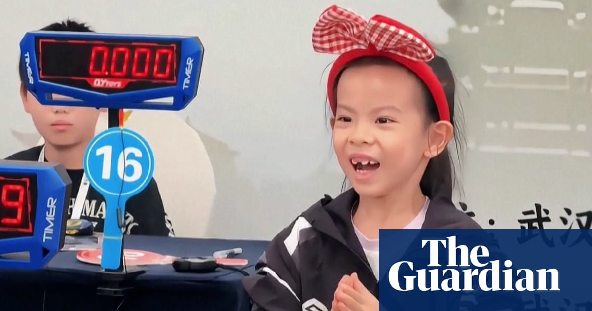 Six-year-old breaks women's world Rubik's Cube record – video