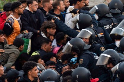 Spain's police launch operation to clear migrants off Ceuta beach