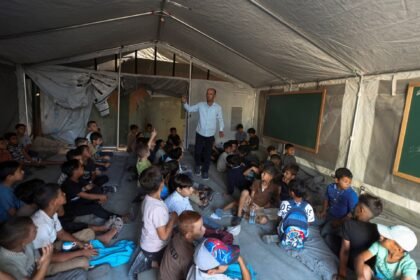 Photos: Gaza’s children return to class in tents and ruins