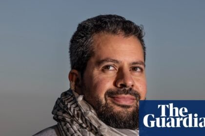 Palestinian careers adviser who was allegedly told to stop wearing keffiyeh at Sydney school sues for racial discrimination