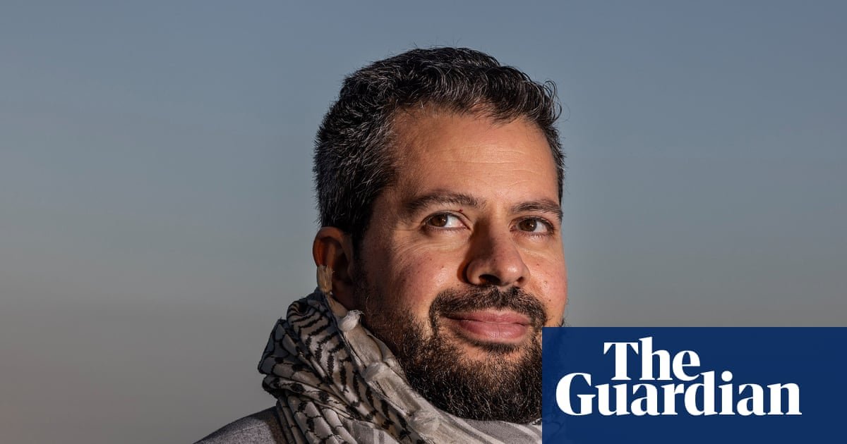 Palestinian careers adviser who was allegedly told to stop wearing keffiyeh at Sydney school sues for racial discrimination