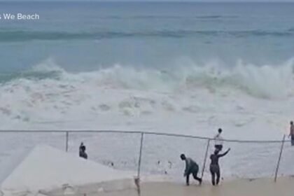 WATCH:  Video shows woman's terrifying rescue from rough surf in the Bahamas