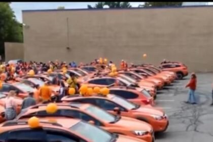 WATCH:  Annual orange car parade grows in popularity