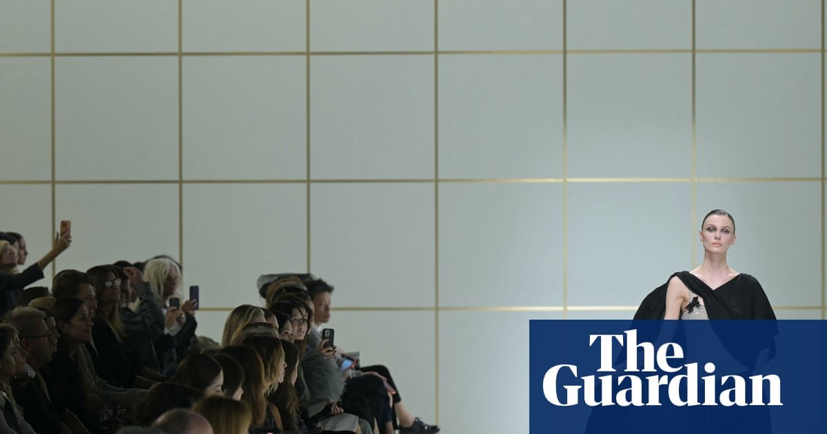 With turbulence all around, Armani plays it safe and easy in Milan