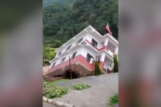 Watch: Moment a government building collapses into a river in Nepal amid floods