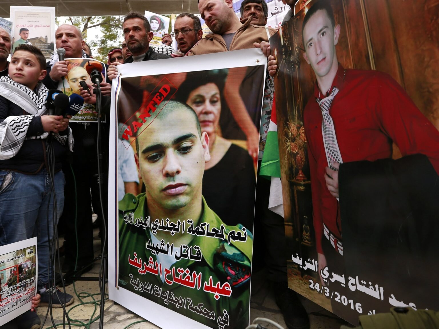 Israel’s president pardons soldier who killed wounded Palestinian in 2016