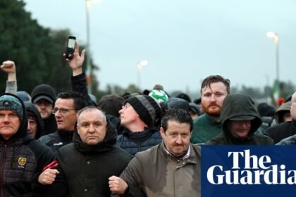 Tense standoff over loyalist march in Portadown as protesters block route