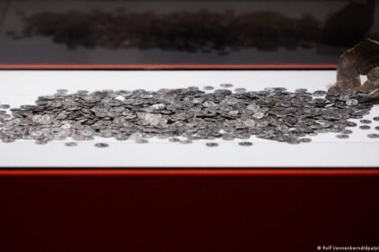 Amateur archeologist unearths Germany's largest trove of Roman coins