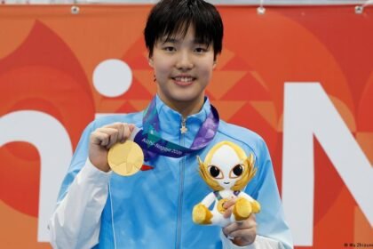 China's 13-year-old swimming star raises questions on child athletes