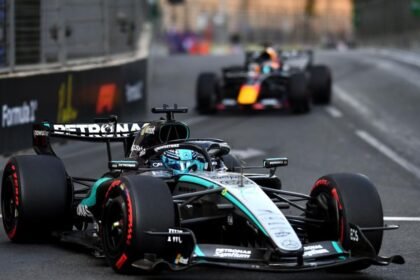 Russell wins despite late Verstappen challenge