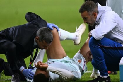 Mbappe goal overshadowed by knee injury to mar Zidane debut France win
