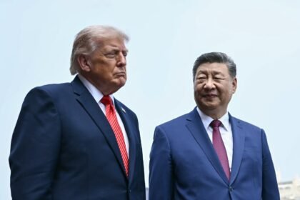 The Latest: China’s Xi to kick off visit to Washington with a rare planeside welcome from Trump