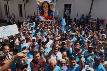 Venezuelans rally for opposition leader’s return and presidential elections