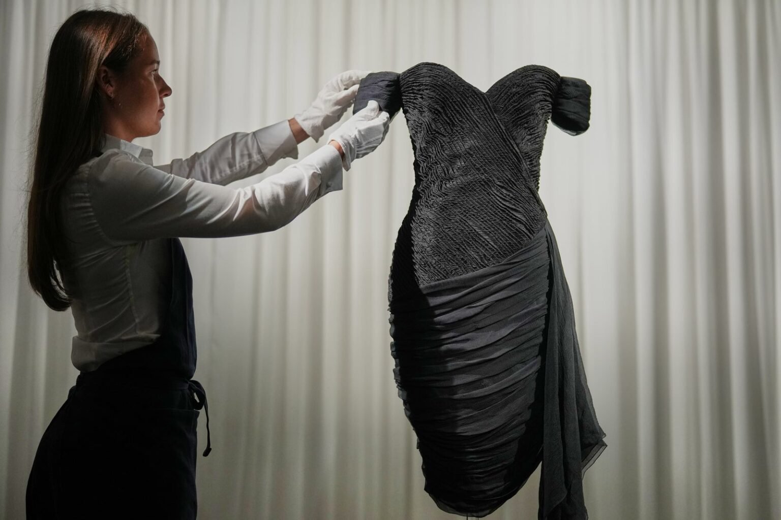 Back in black: Princess Diana's 'revenge dress' goes on show ahead of Sotheby's auction