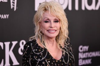 Dolly Parton’s Manager Files for Restraining Order Against Fired Nephew, Alleging Ex-Security Head Sent ‘Terrorizing’ Texts and Threatened to ‘Destroy the Entire Brand’