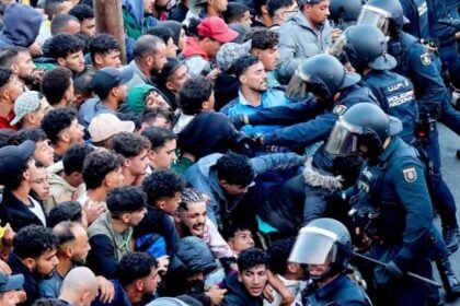 Police begin operation to move migrants from Ceuta beaches