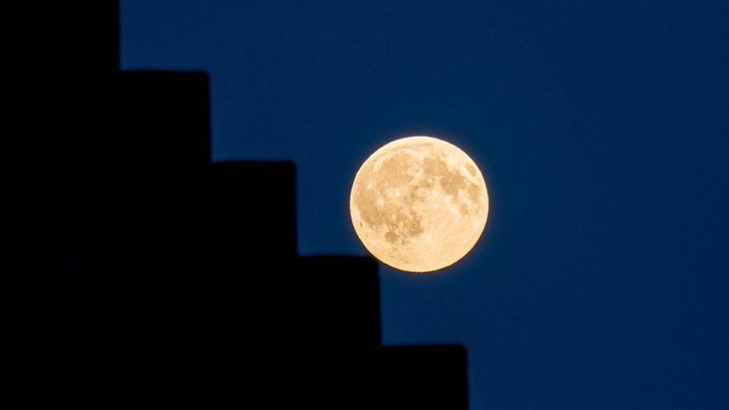 Your pictures of the Harvest Moon shimmering across the UK sky