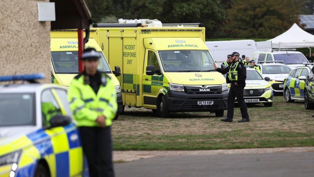 Men held in major incident near RAF base as homes evacuated