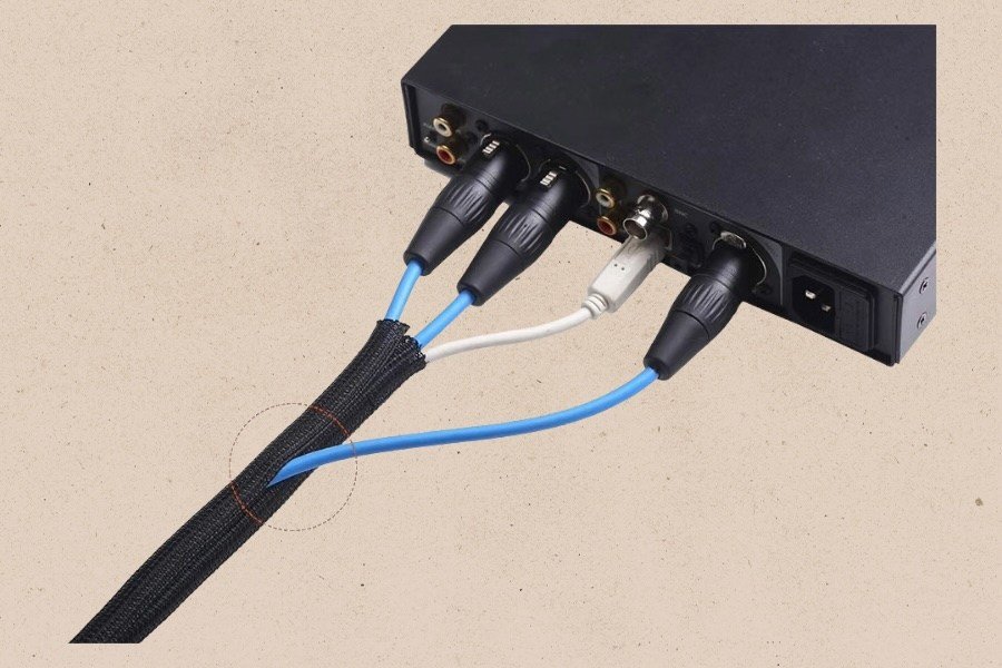 This $9 ‘Cable Sleeve’ Organizes All Your Loose Cords and Prevents Pets From Chewing on Them