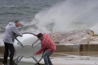 Nor'easter barrels down on East Coast, threatens millions with flooding, winds