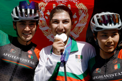 Cyclist who dressed as man to avoid Taliban wins silver medal