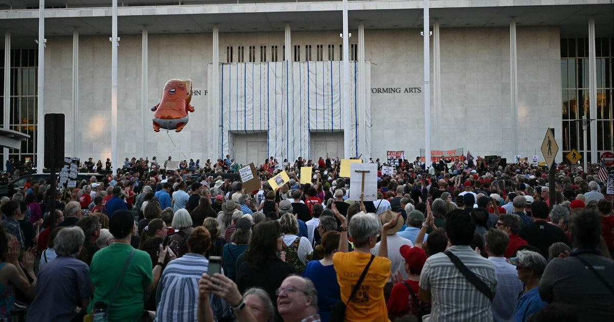 Protesters gather outside Kennedy Center after Trump threatens demolition