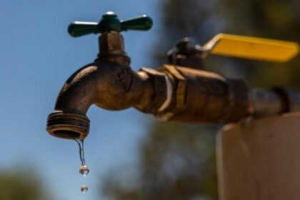 Homes without water and roads closed after burst pipe