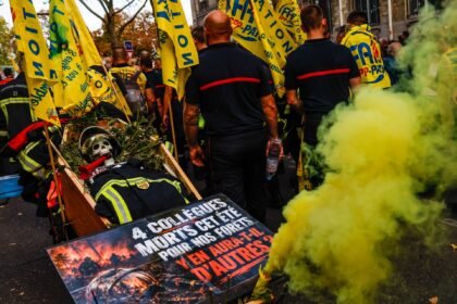 Public workers in France strike over pay as student protests turn violent