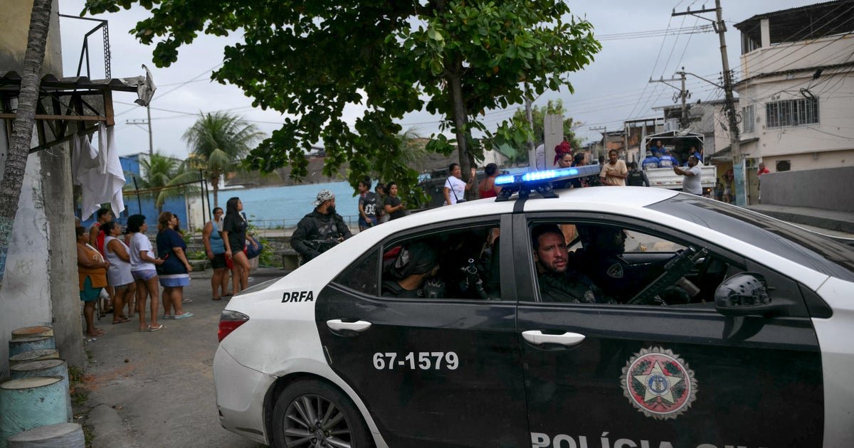 Police capture suspected serial killer disguised as woman, carrying baby