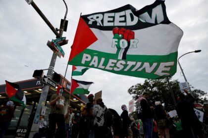 Pro-Palestine protesters demonstrate outside Ed Sheeran concert
