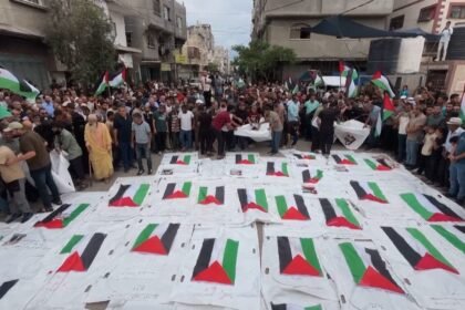 Mourners in Gaza bury remains of loved ones killed in 2023 Israeli strike