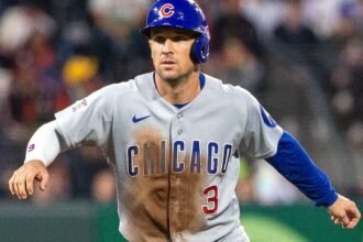 Bregman hit in face by foul ball while on deck