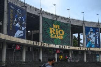 Lamar, Ravens not focusing on field conditions for NFL's 1st game in Rio