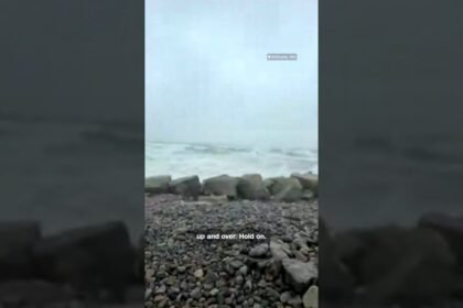 CNN Weather Meteorologist loses hat playing catch in the nor'easter