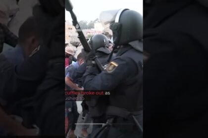 Police hit migrants with batons during camp transfer in Ceuta | AJ #shorts