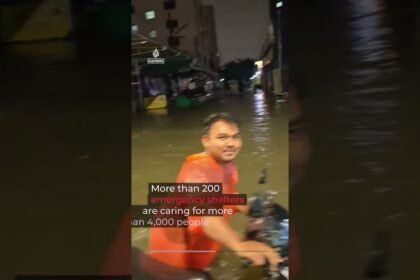 Bangkok declared disaster zone after heavy rains submerge road