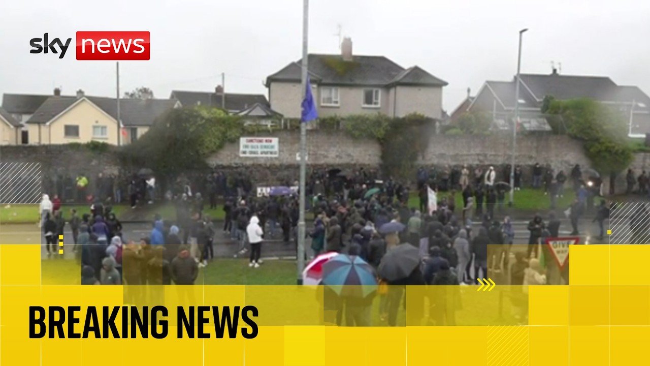 Crowds gather as Orange Order given go-ahead to march down nationalist street in Northern Ireland